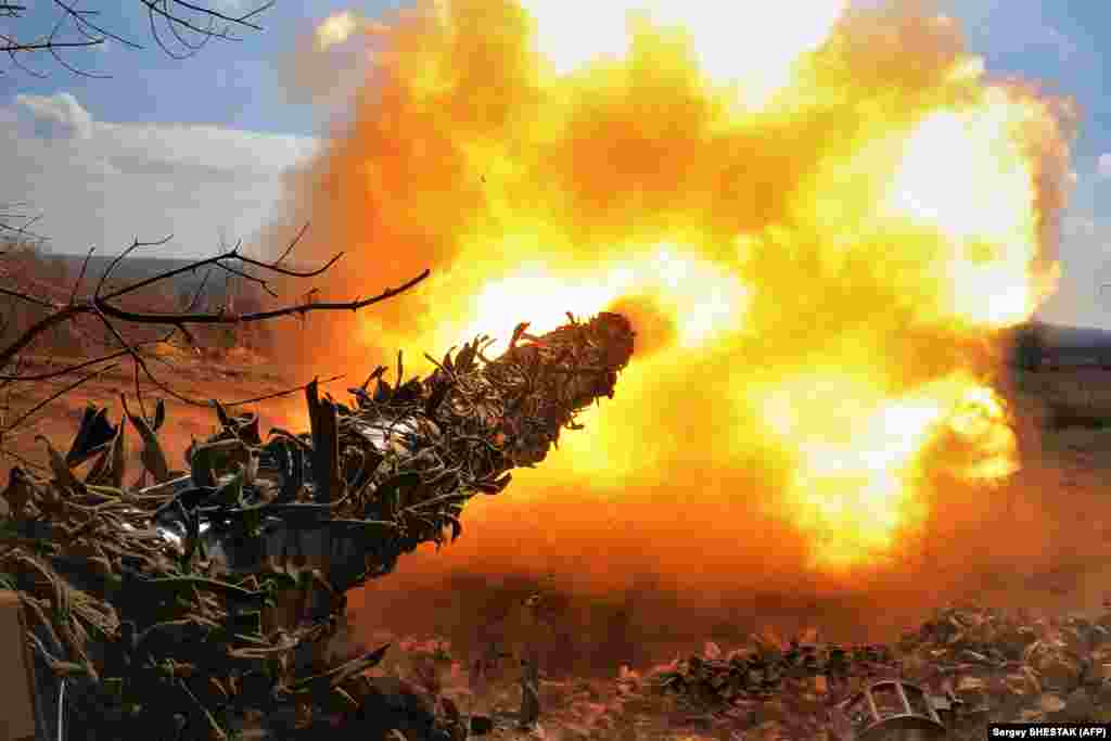 A Ukrainian T-72 tank fires at Russian positions on the front line near Bakhmut on March 26. A day earlier, Ukraine's top military commander, Valeriy Zaluzhniy, said that the situation in and around Bakhmut had "stabilized" despite Russian mercenaries from the private Wagner group leading the assault to capture the ruined city.
