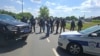 Policija sprečava demonstante da priđu gradilištu koje je posetio predsednik Aleksandar Vučić, 12. jul 2025. 