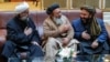 Москвадагы сүйлөшүүгө катышкан “Талибан” кыймылынын өкүлдөрү. 