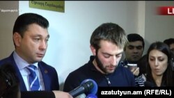 Armenia - Student activist David Petrosian (center) and Deputy Parliament Speaker Eduard Sharmazanov talk to reporters after their meeting, 15Nov, 2017