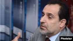 Armenia -- Presidential candidate Aram Harutiunian at a press conference in Yerevan, 09Dec2013.