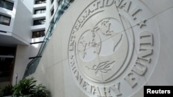 ԱՄՀ լոգոն Վաշինգտոնում Հիմնադրամի կենտրոնակայանի պատին, արխիվ