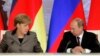 Ангела Меркель (л) и Владимир Путин (п)