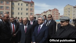 Armenia - President Serzh Sarkisian inspects new apartment blocks constructed in Gyumri, 7Apr2012. 
