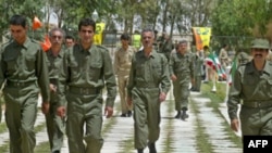 شبه نظامیان عضو سازمان مجاهدین خلق در پایگاه اشرف عراق